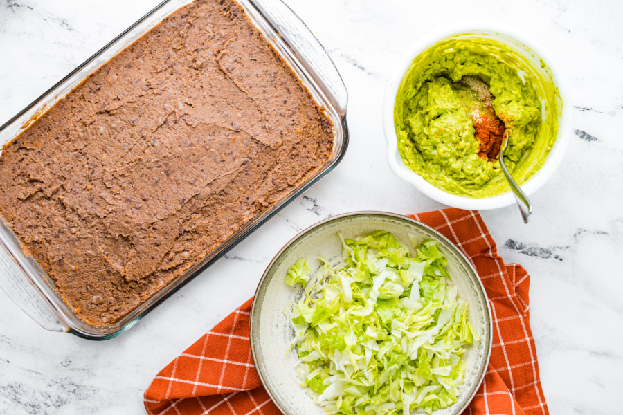 beans spread onto bottom of pan