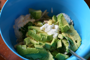 Healthy Avocado Chicken Salad ingredients in a large mixing bowl