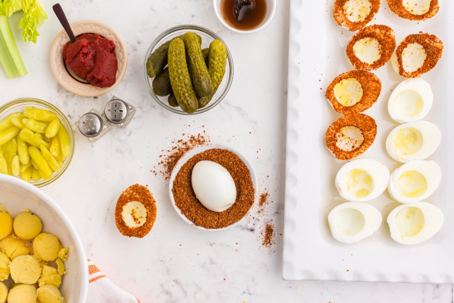 dipping eggs edges in seasoning