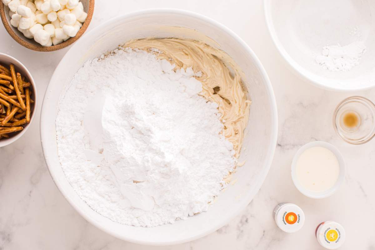 confectioners' sugar added to bowl