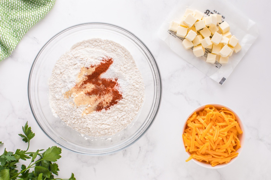 flour, baking powder, garlic, salt, and paprika in a mixing bowl