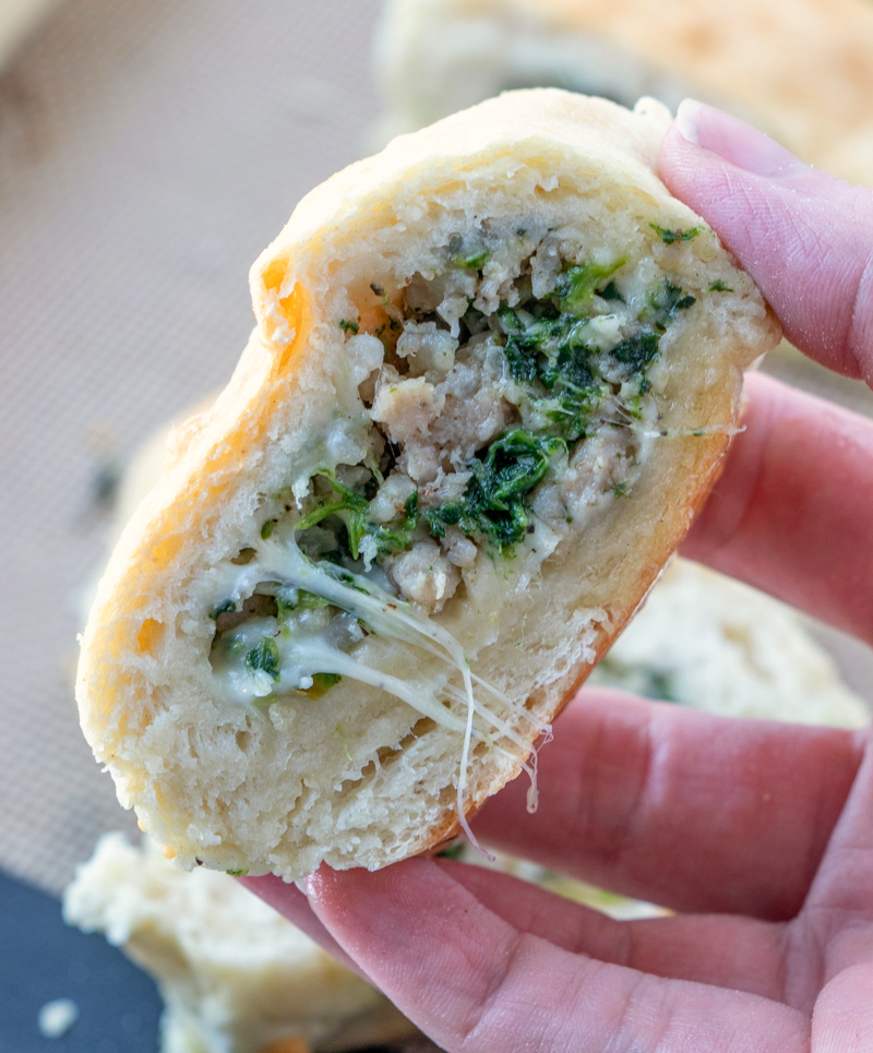 Cheesy Sausage Spinach Bread - slice of cheesy sausage bread