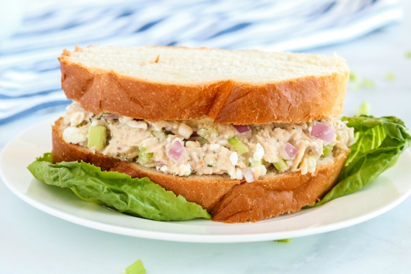 Cottage Cheese Tuna Salad served as a sandwich on a white plate