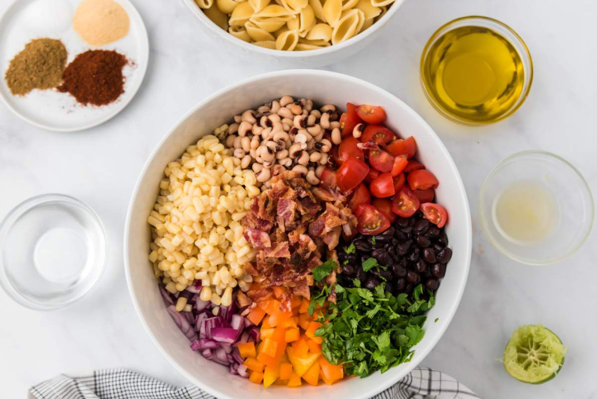 ingredients for Cowboy Caviar Pasta Salad in a bowl