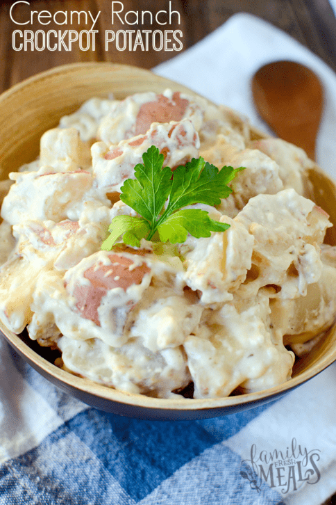 Creamy Ranch Crockpot Potatoes recipe served in a wooden bowl