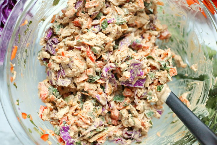 Creamy Thai Chicken Salad - chicken salad mixed in a glass bowl