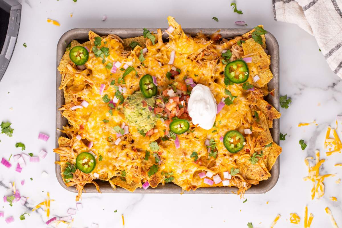 Crockpot Chicken Nachos on baking sheet