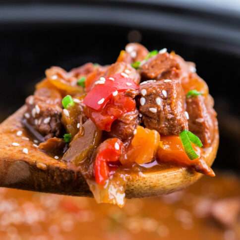 spoon scooping up some Crockpot Sweet and Sour Pork