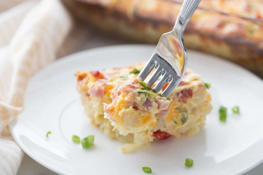 fork picking up a piece of breakfast casserole