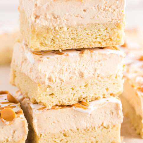 Fluffernutter Cheesecake Bars stacked on a plate