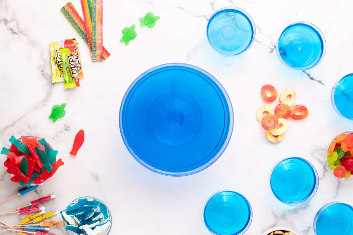 blue gelatin mixture in trifle dish and small cups