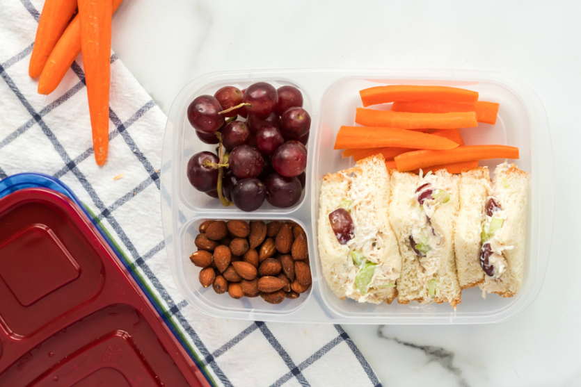 Healthy Chicken Salad lunchbox Idea - Packed in Easy Lunch Boxes with grapes, carrots and nuts- Family Fresh Meals recipe