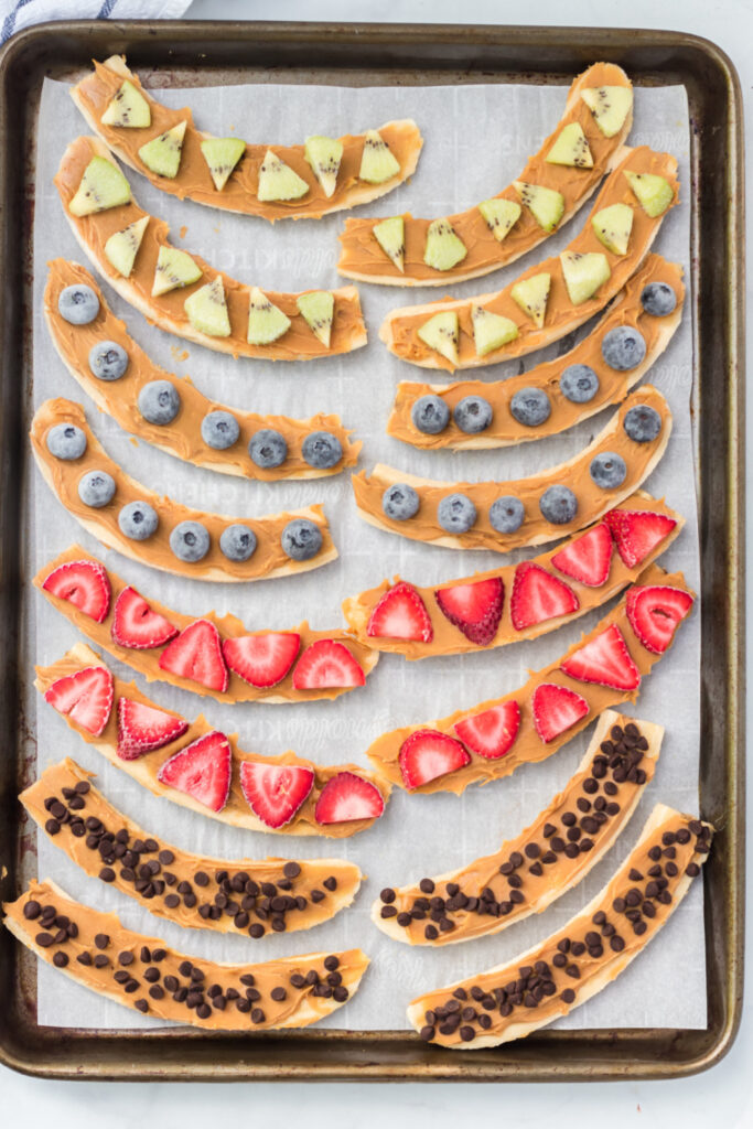 Healthy Frozen Banana Treats on a lined baking sheet