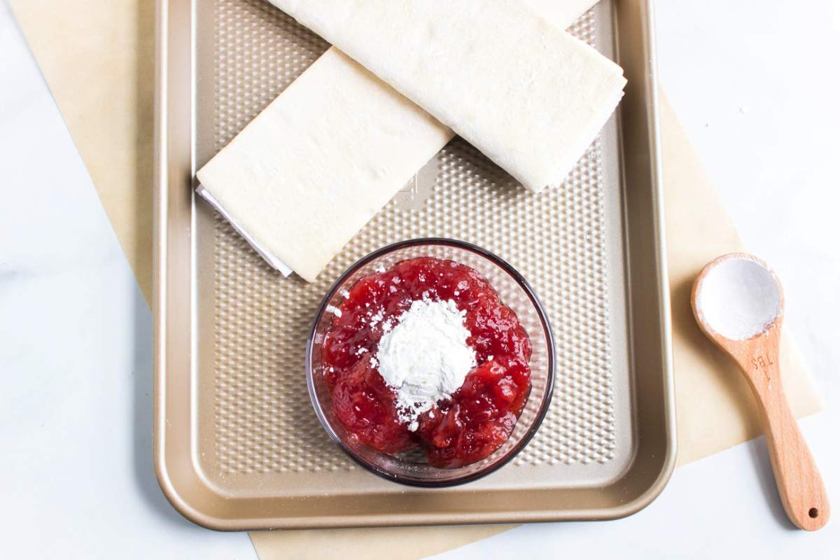 mixing sugar into jelly