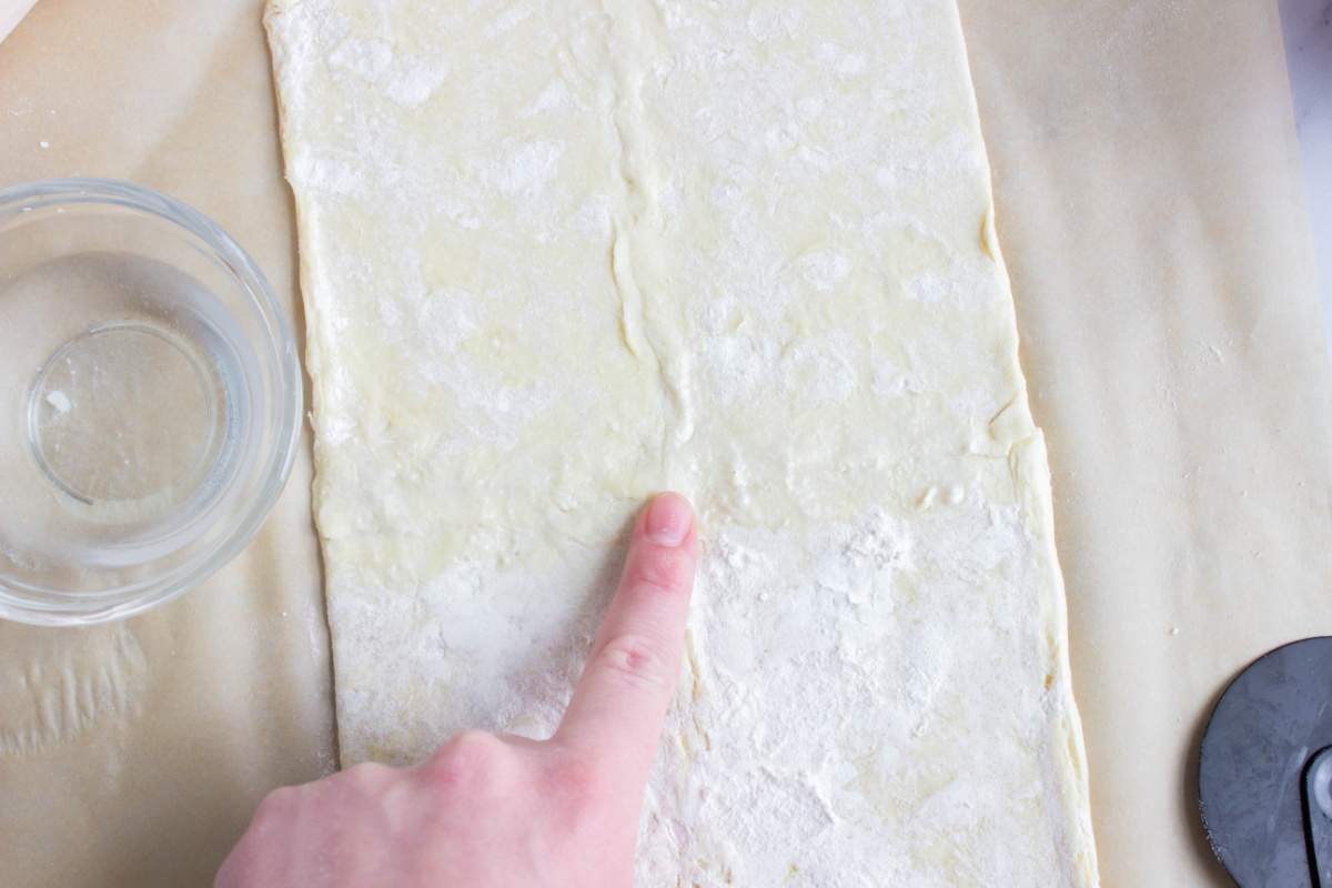 sealing the two pieces of pastry together