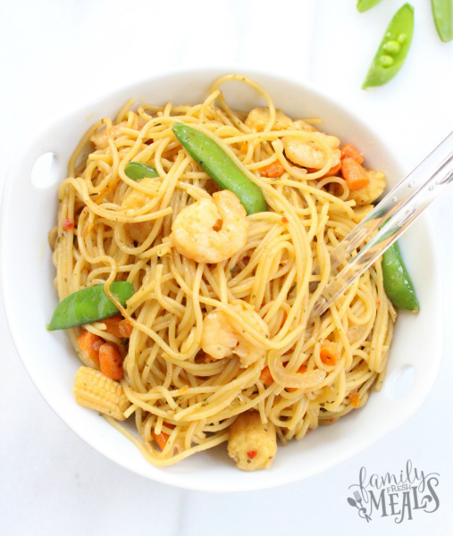 Honey Garlic Shrimp Lo Mein in a bowl with chop sticks