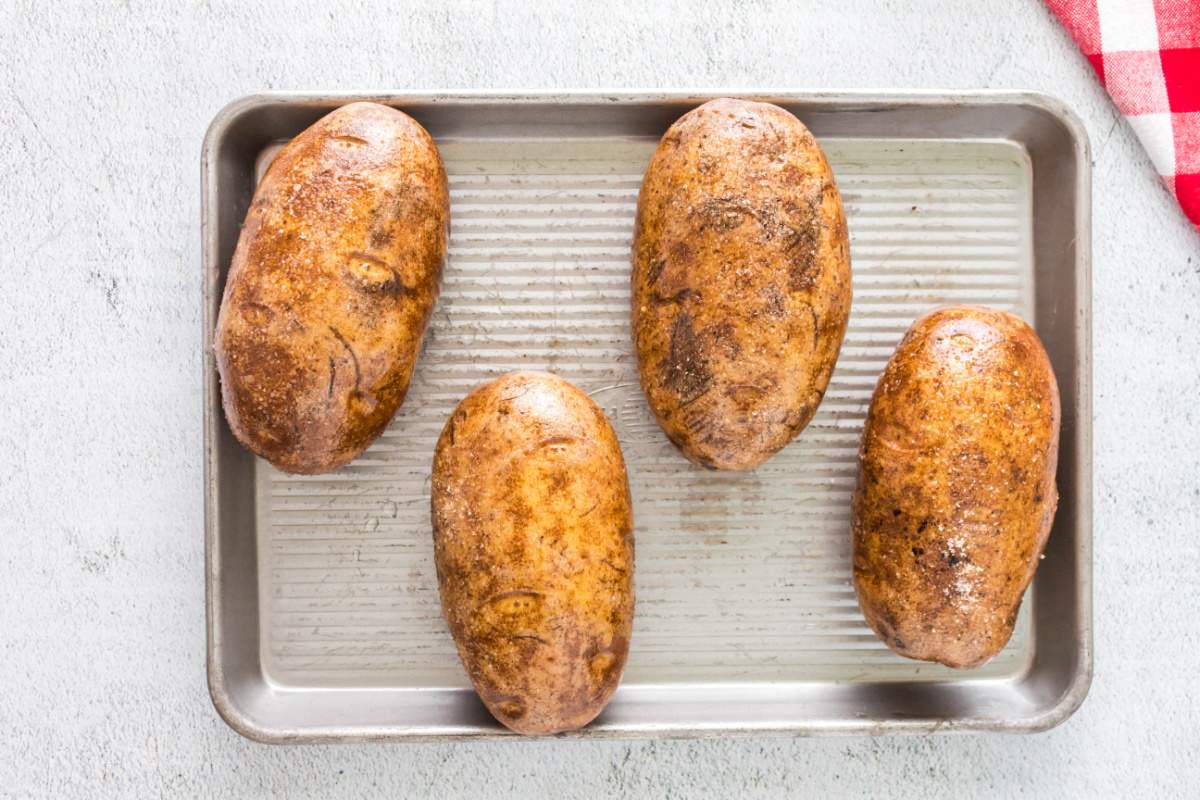 potatoes coated with oil and seasoning