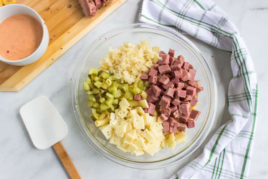 ingredients for Reuben Pasta Salad in a bowl