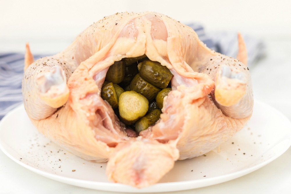 Instant Pot Dill Pickle Chicken Recipe - whole chicken stuffed with sliced dill pickles