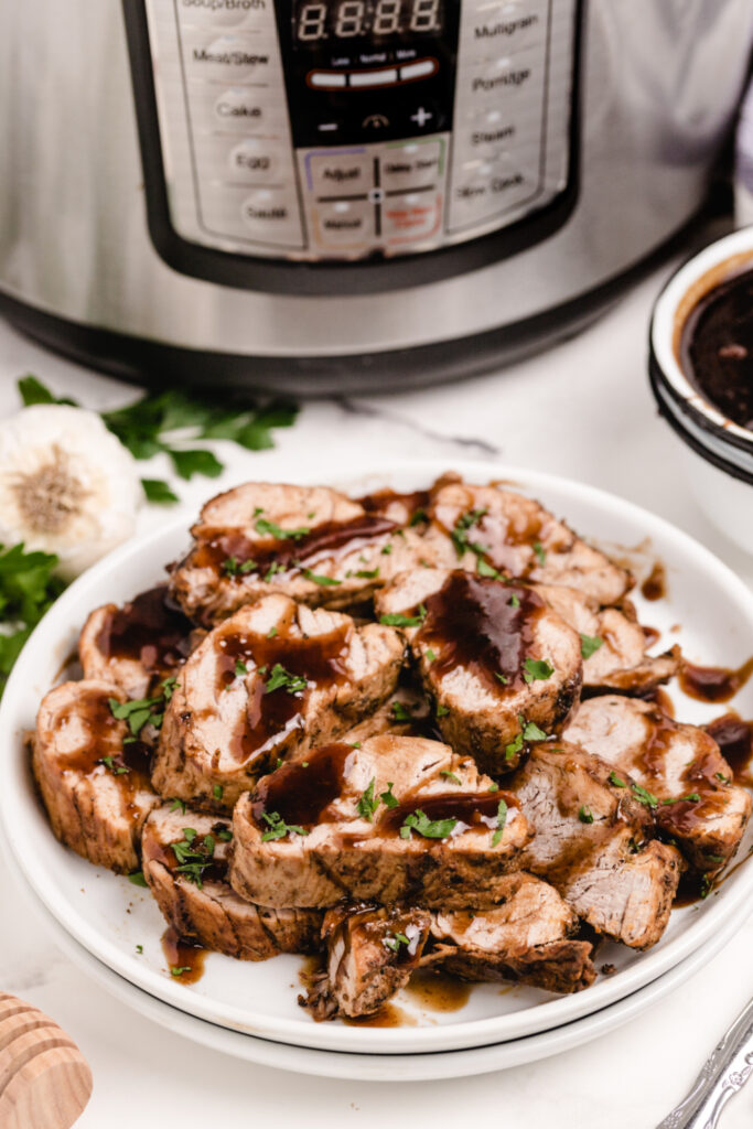 Instant Pot Pork Tenderloin with Honey Balsamic Sauce on a plate