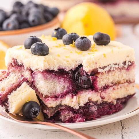 Lemon Blueberry Tiramisu cake on a plate