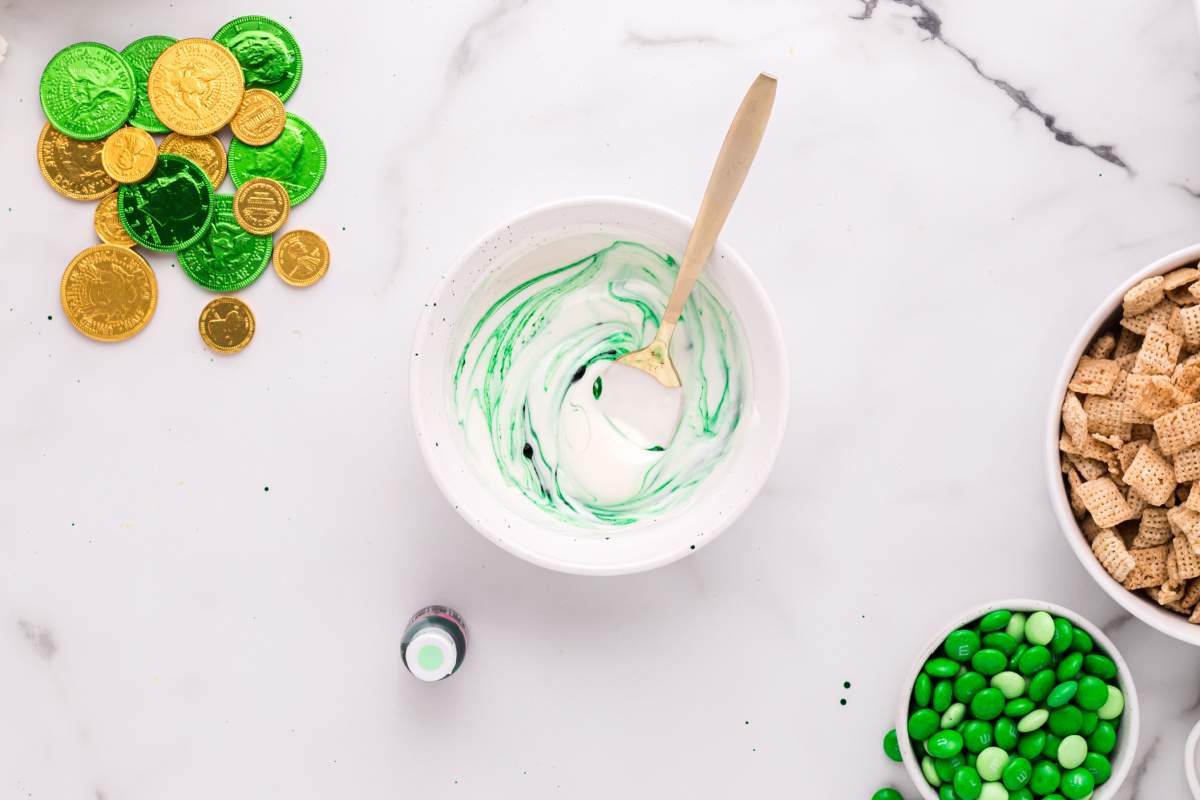 food dye being added to melted chocolate