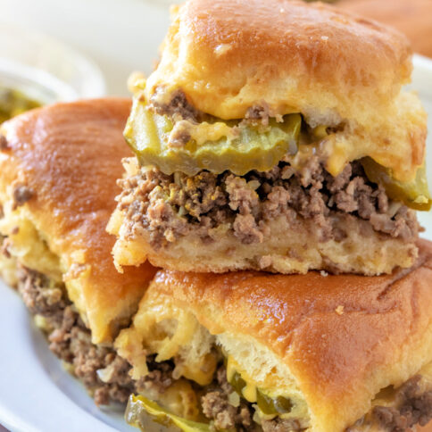 Maid Rite Sliders stacked on a plate