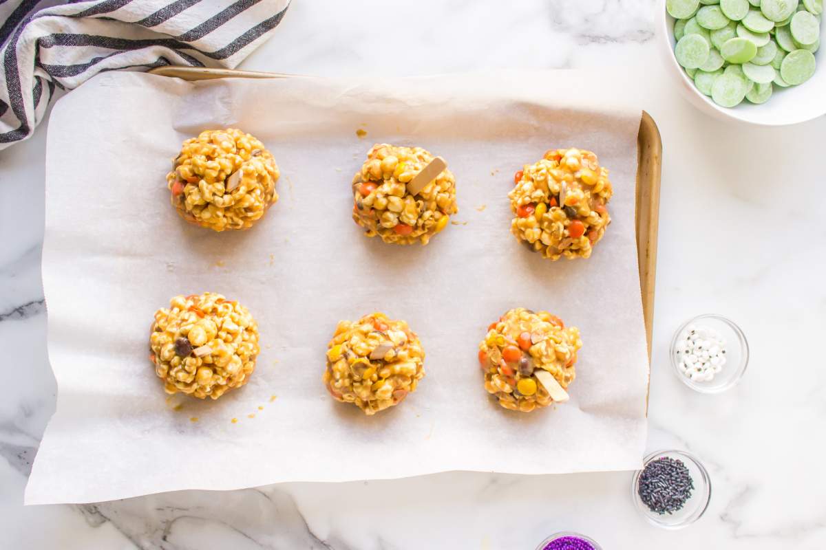 popcorn balls on a baking sheet