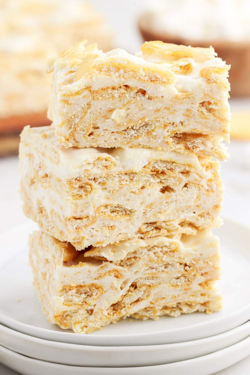 Ritz Krispie Treats stacked on a plate