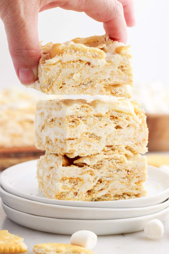 Ritz Krispie Treats stacked on a plate