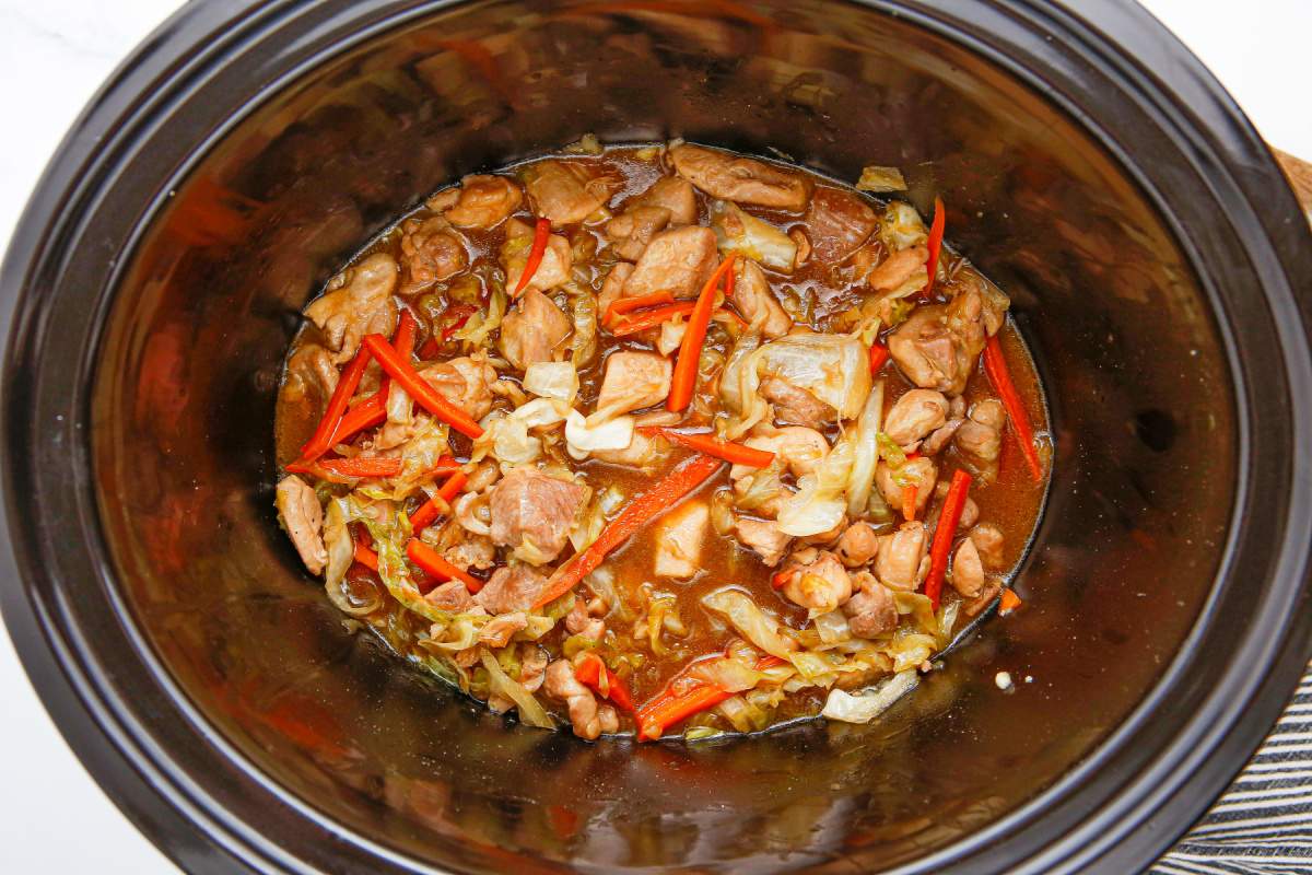 cooked chicken and vegetables in slow cooker