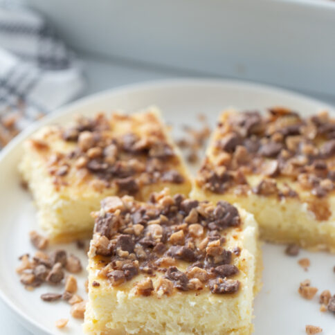 Toffee Crunch Cheesecake Bars on a plate