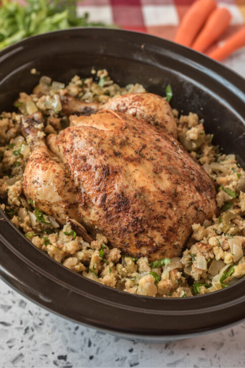 Whole chicken and stuffing in a slow cooker